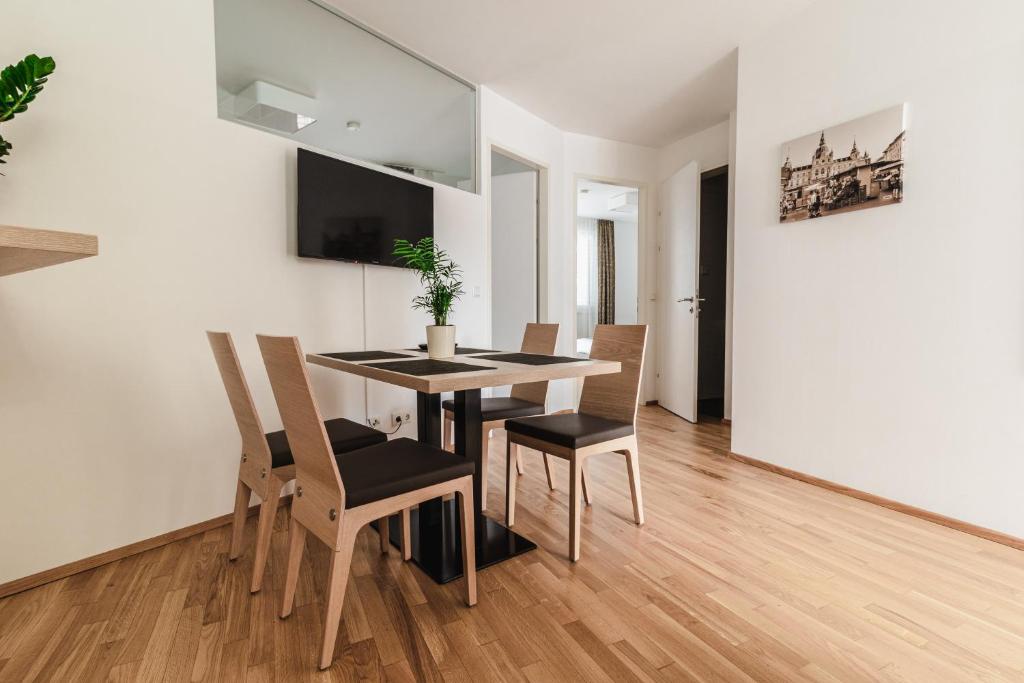 Televízia a/alebo spoločenská miestnosť v ubytovaní Albert Schweitzer Center Graz