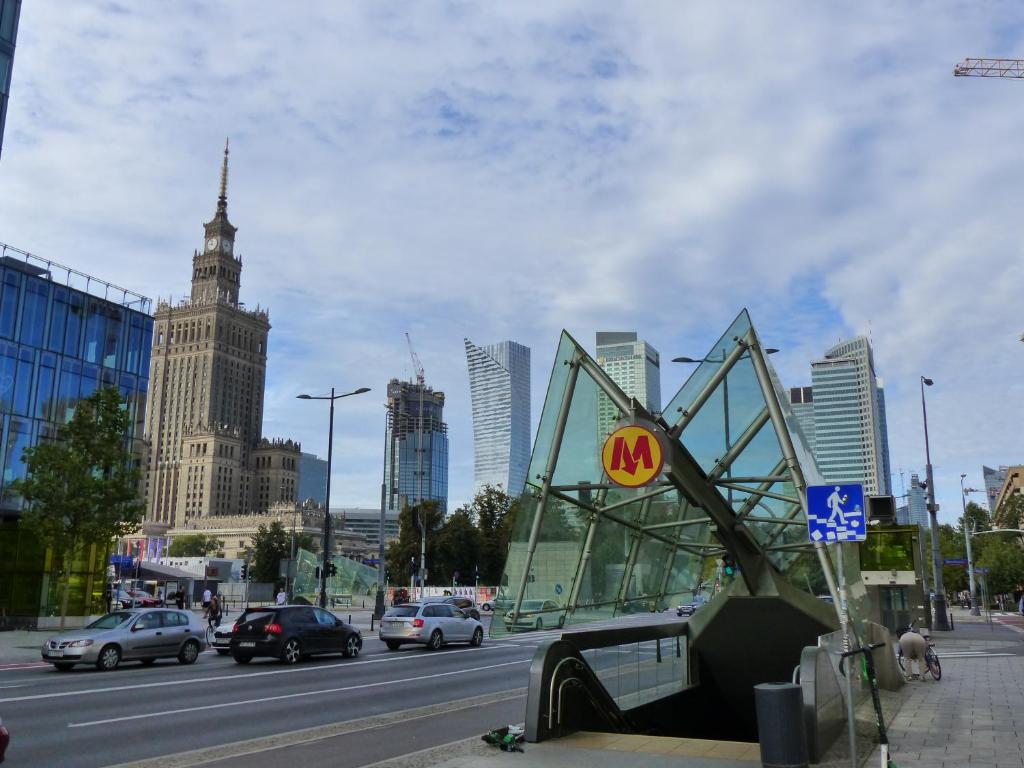 a view of a city with cars on a street at Hosapartments City Center in Warsaw