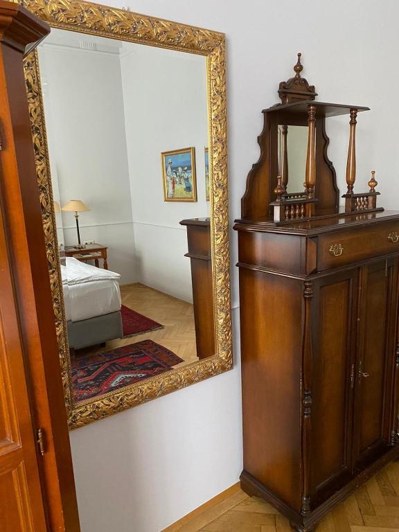 Una cama o camas en una habitación de Boutique Hotel Nossek