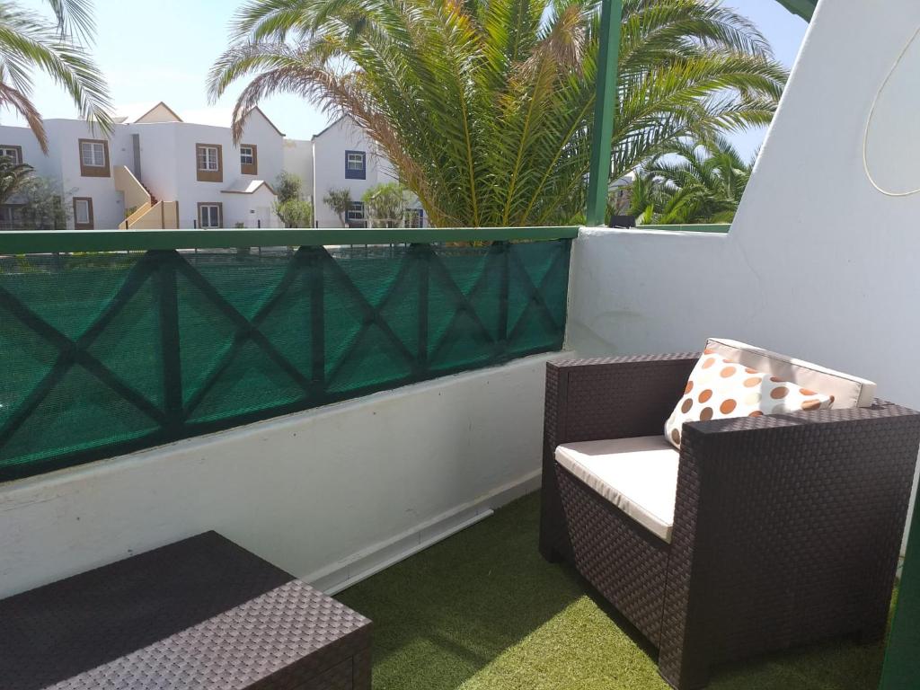 Posezení v ubytování Apartment duplex -The Sunny Hut - swimming pool - Free Wifi & AC- Residence Las Marinas
