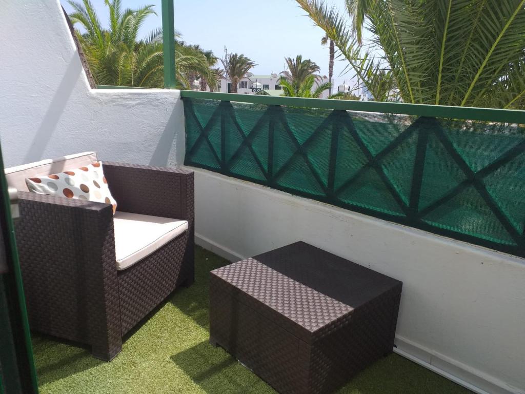 Posezení v ubytování Apartment duplex -The Sunny Hut - swimming pool - Free Wifi & AC- Residence Las Marinas