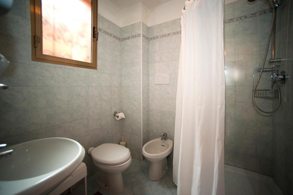 Koupelna v ubytování Hotel Fontana