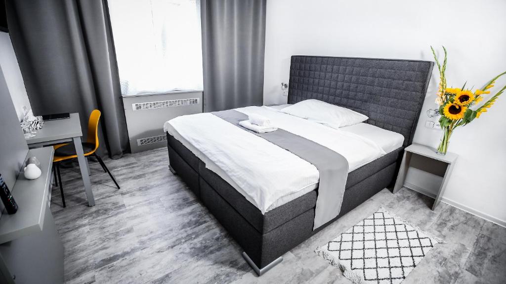 Postel nebo postele na pokoji v ubytování Hotel Gong
