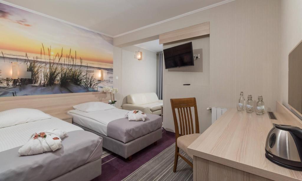 Posteľ alebo postele v izbe v ubytovaní Hotel SPA Activia