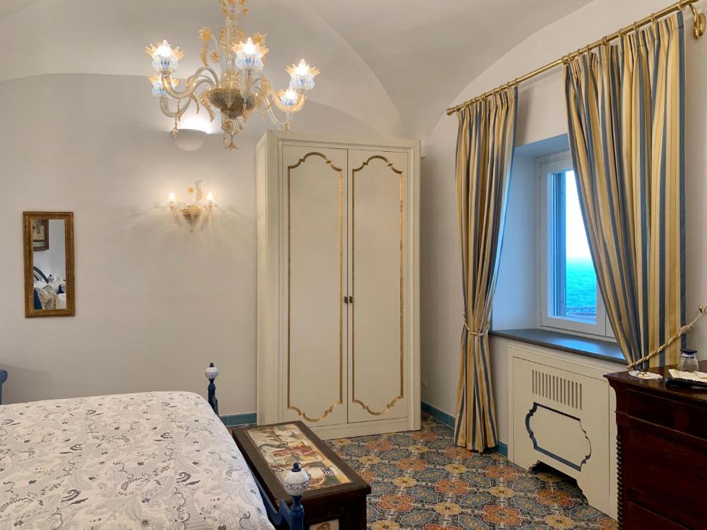 Postel nebo postele na pokoji v ubytování Villa Le Baste