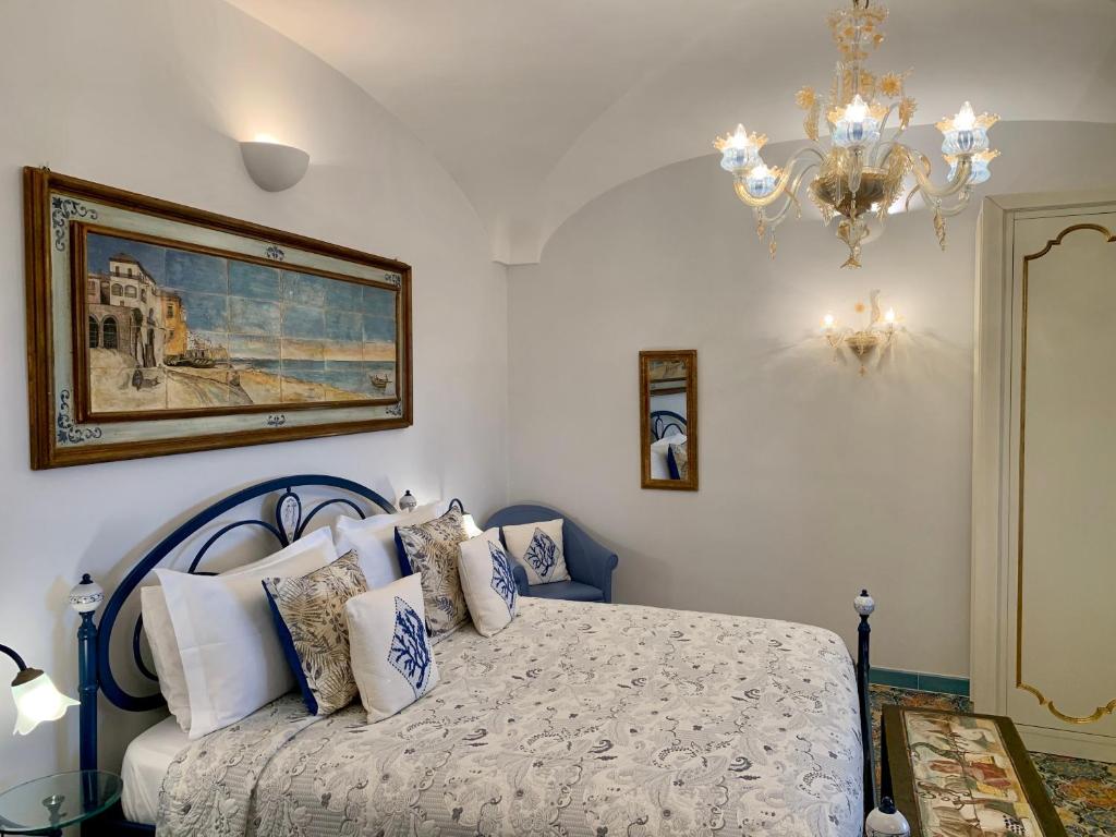 Postel nebo postele na pokoji v ubytování Villa Le Baste