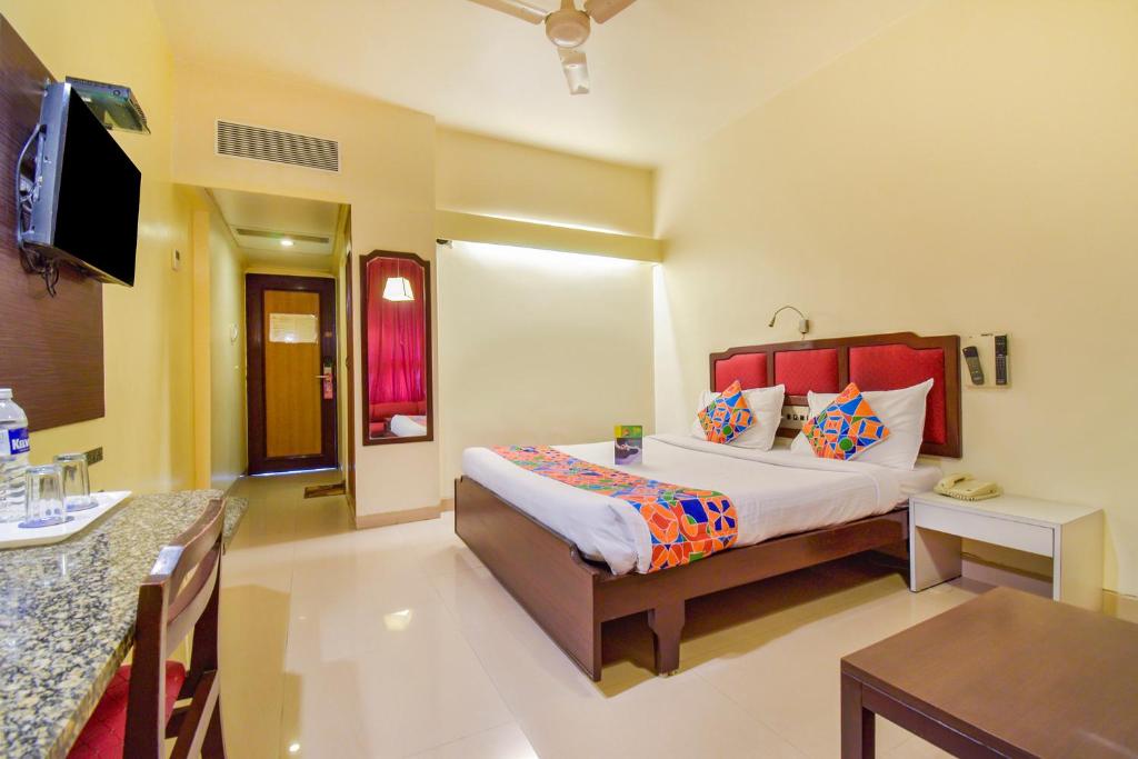 Cama o camas de una habitación en Hotel Ashish Plaza
