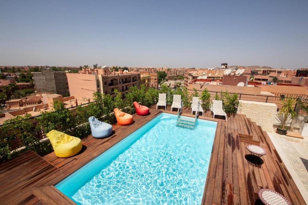Bazén v ubytování Hôtel Ibn Batouta nebo v jeho okolí