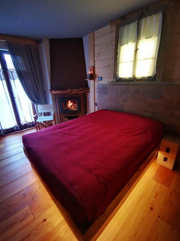 Posteľ alebo postele v izbe v ubytovaní B&B Ronco Carbon