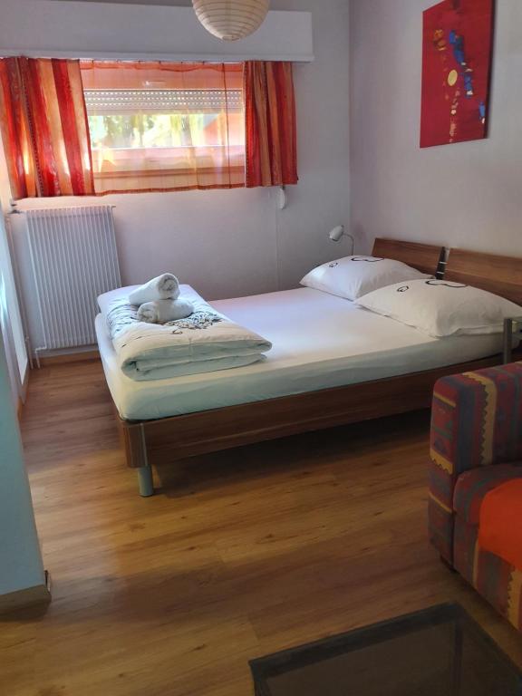 Voodi või voodid majutusasutuse Motel - Hôtel "Inter-Alp" à St-Maurice toas