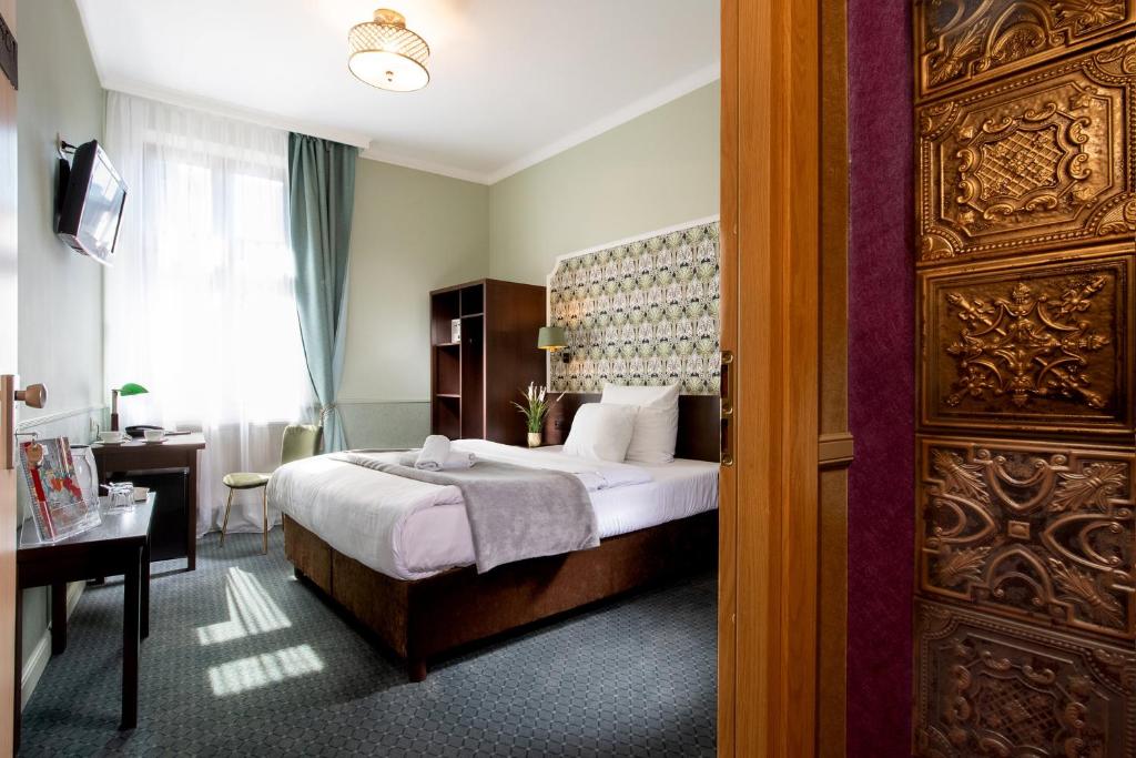 Posteľ alebo postele v izbe v ubytovaní Amber Boutique Hotels - Hotel Amber