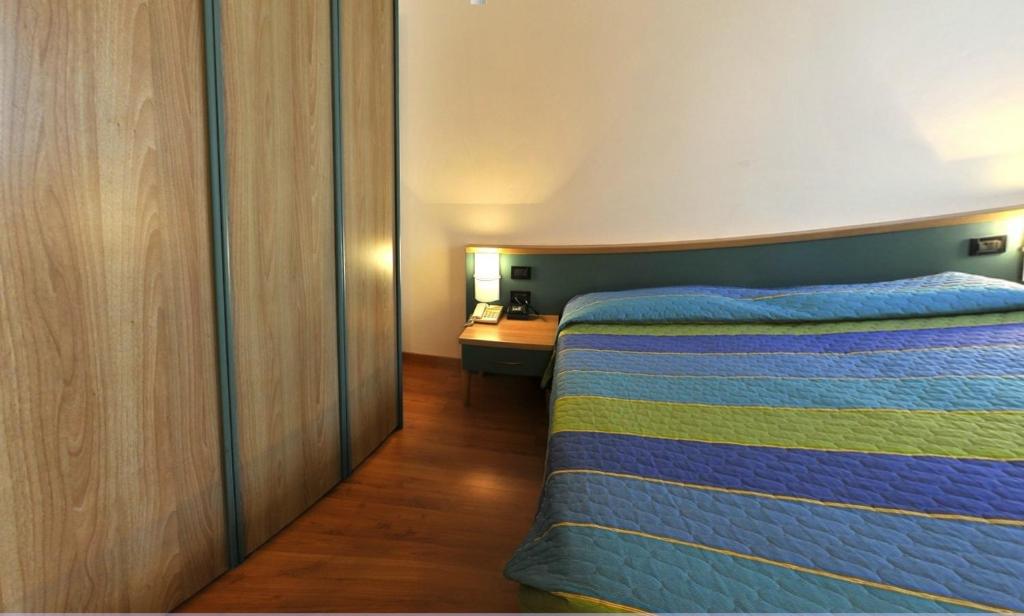 Postel nebo postele na pokoji v ubytování Hotel Vela