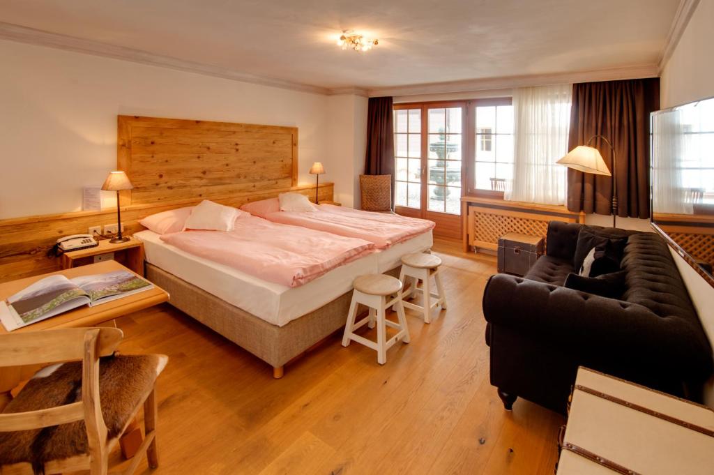 Postel nebo postele na pokoji v ubytování Hotel Berghof