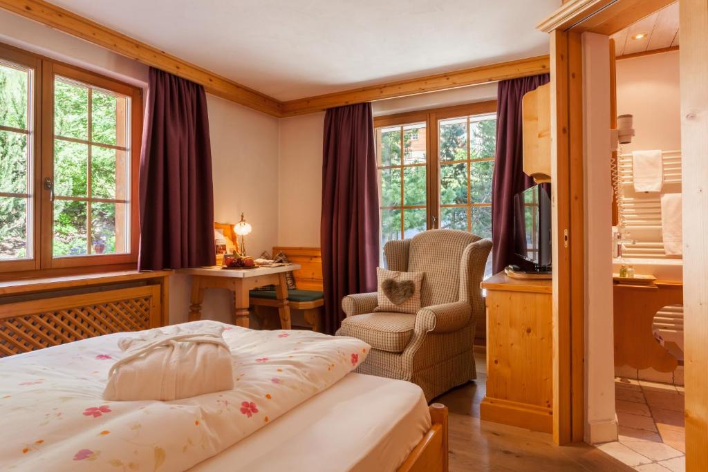Postel nebo postele na pokoji v ubytování Hotel Berghof