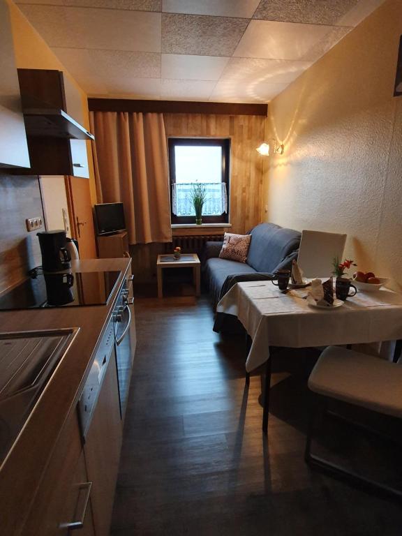 Kuchyň nebo kuchyňský kout v ubytování Gästehaus Hutweide