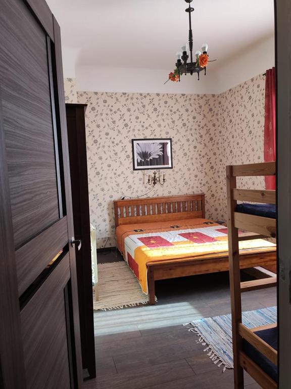 Postel nebo postele na pokoji v ubytování Chelsea Roosi 11 Apartment