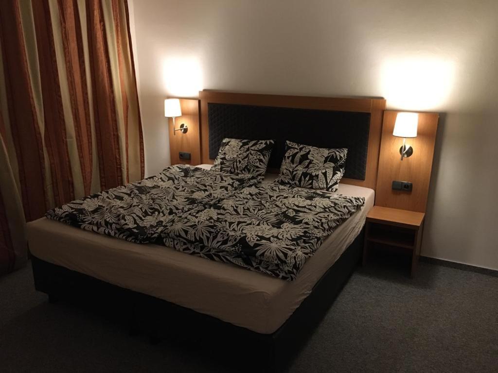 Postel nebo postele na pokoji v ubytování Ubytování v podhůří Šumavy nedaleko AT a DE