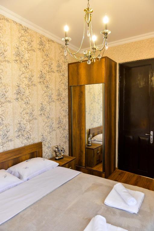 Postel nebo postele na pokoji v ubytování Gold Guest House