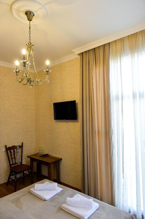 Postel nebo postele na pokoji v ubytování Gold Guest House