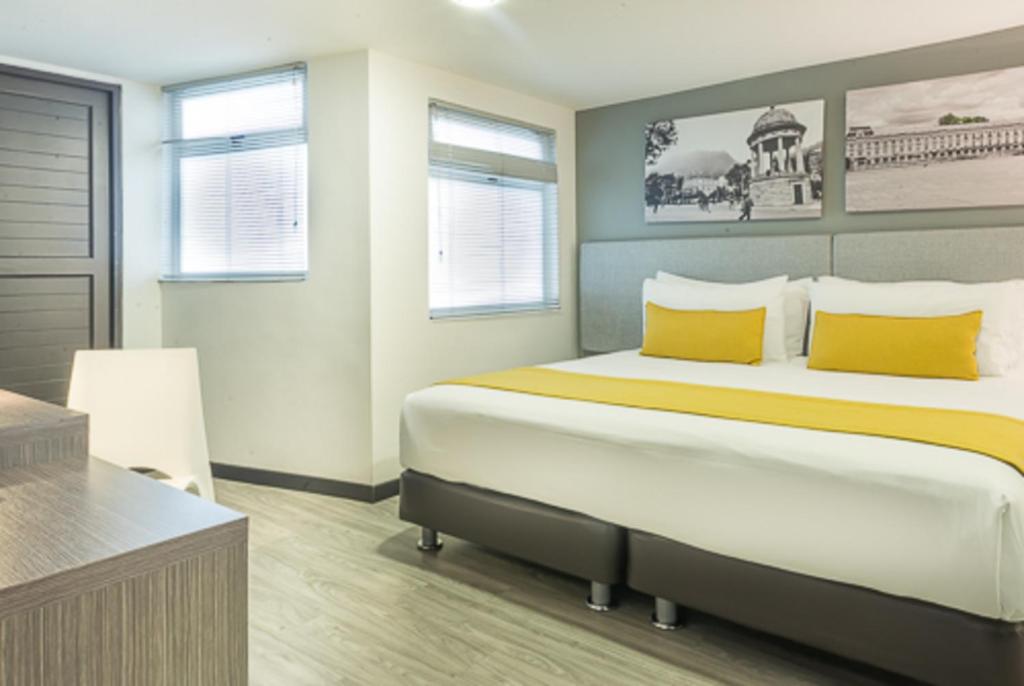 Postel nebo postele na pokoji v ubytování Hotel City Bog Usaquén