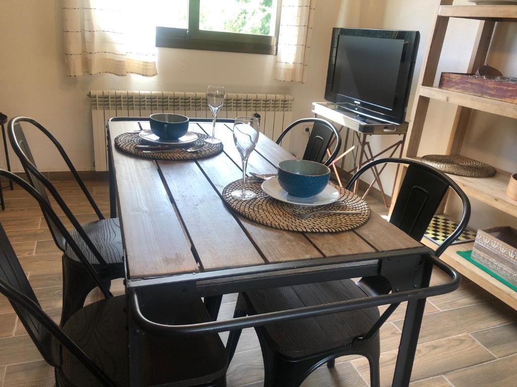 TV a/nebo společenská místnost v ubytování Duplex en el pirineo