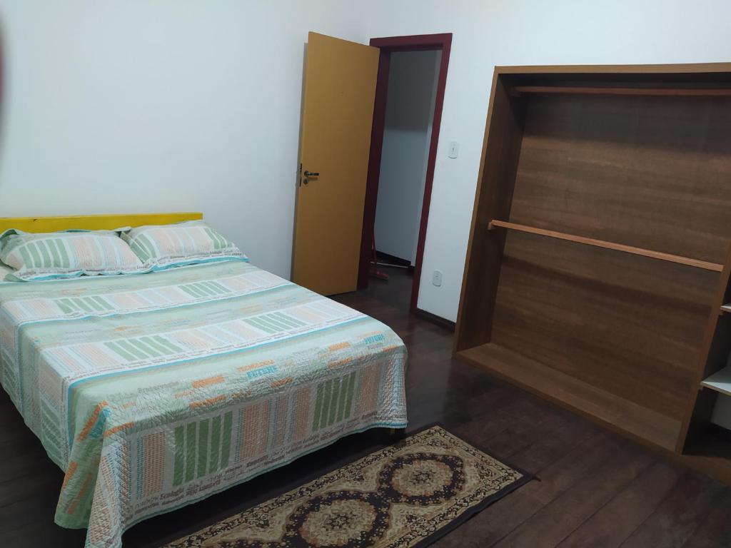 Postel nebo postele na pokoji v ubytování Trilhas de Minas Hostel Camping