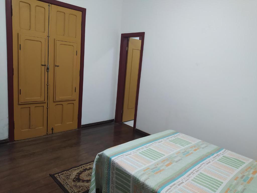 Postel nebo postele na pokoji v ubytování Trilhas de Minas Hostel Camping