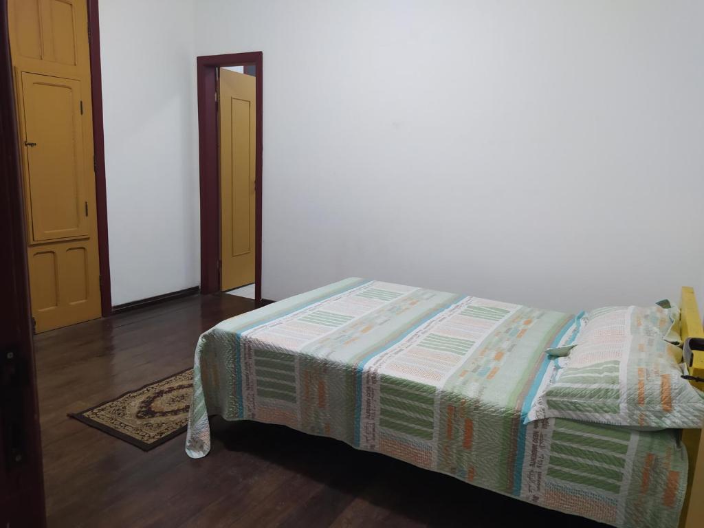 Postel nebo postele na pokoji v ubytování Trilhas de Minas Hostel Camping