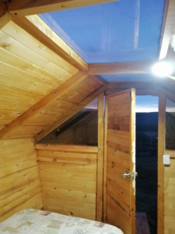 Letto o letti in una camera di Cabañas el mirador del tomine