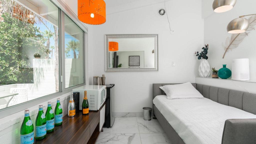 Postel nebo postele na pokoji v ubytování BelleVue Oasis - Adults Only