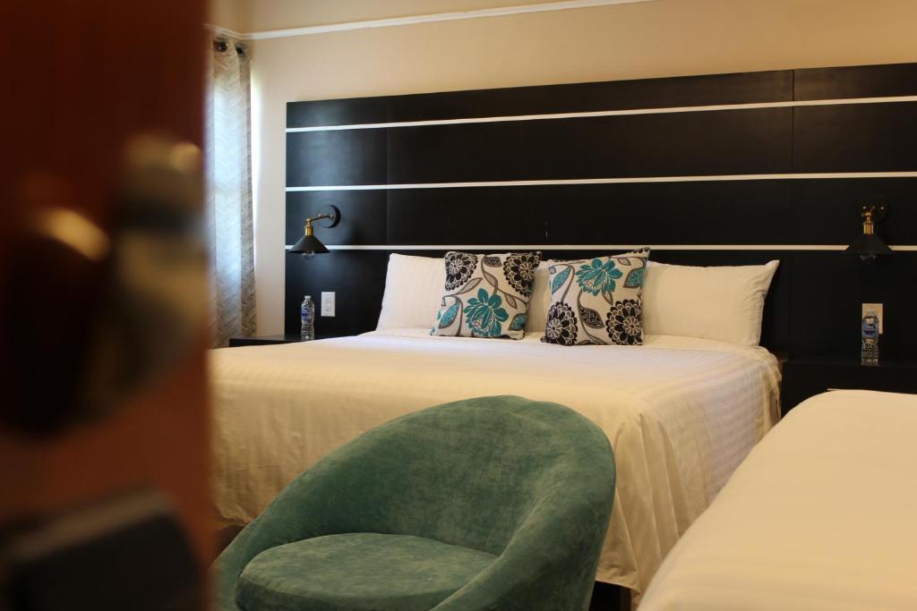 Postel nebo postele na pokoji v ubytování Hotel Cacaxtla