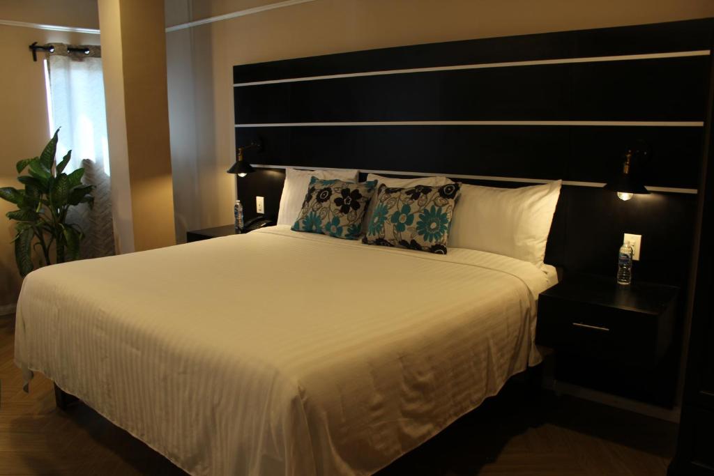 Postel nebo postele na pokoji v ubytování Hotel Cacaxtla