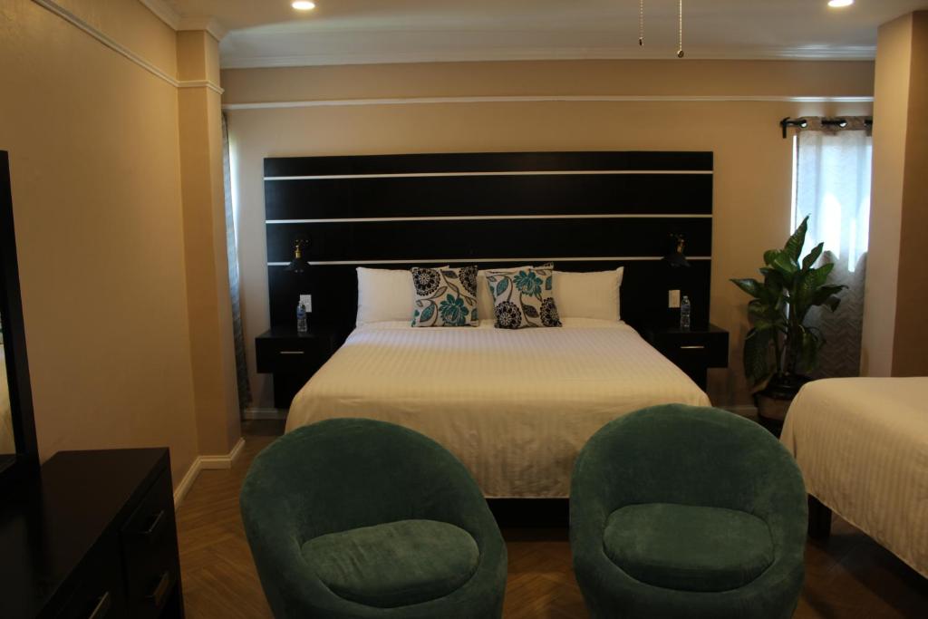 Postel nebo postele na pokoji v ubytování Hotel Cacaxtla
