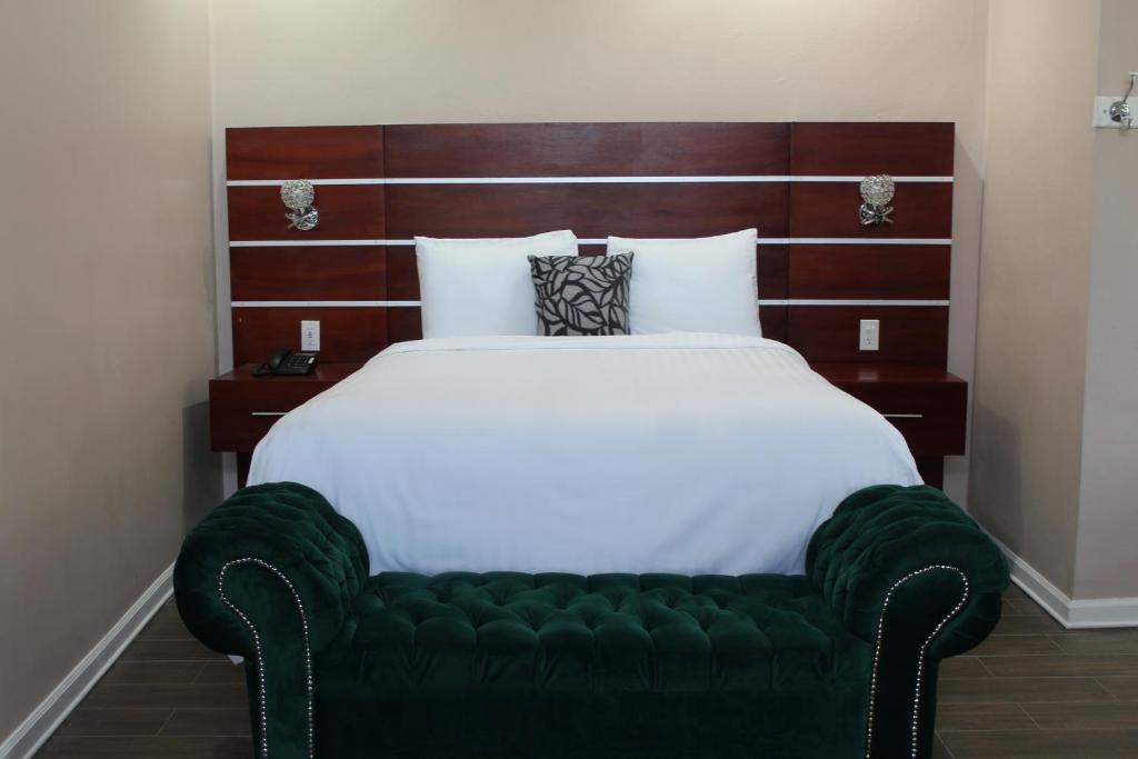 Postel nebo postele na pokoji v ubytování Hotel Cacaxtla