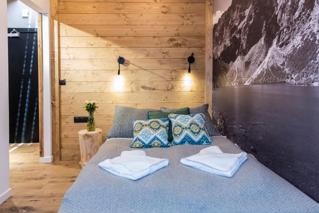 Posteľ alebo postele v izbe v ubytovaní VIP Apartamenty ROYAL SPA