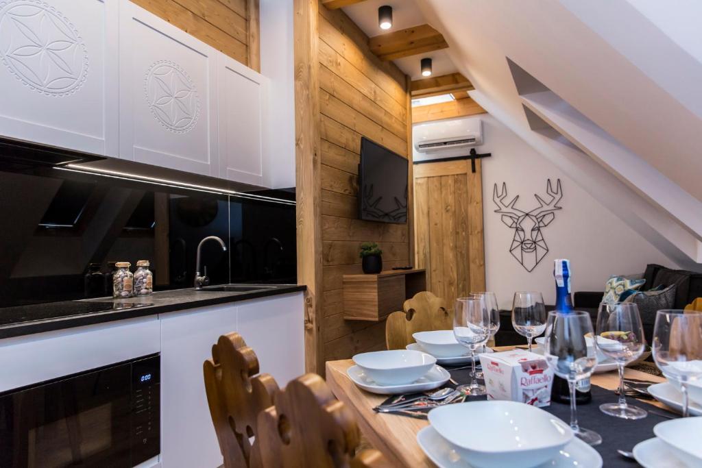 Televízia a/alebo spoločenská miestnosť v ubytovaní VIP Apartamenty ROYAL SPA