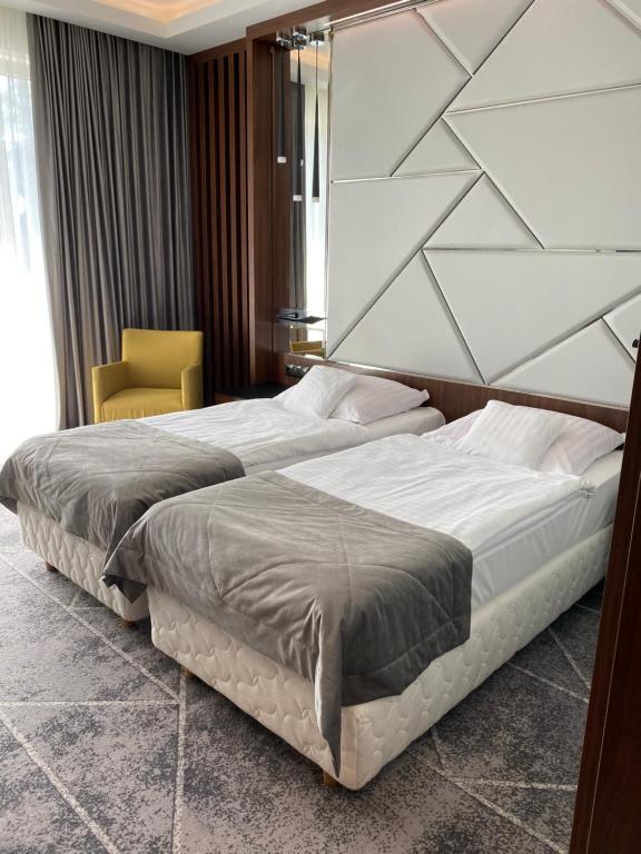 Krevet ili kreveti u jedinici u okviru objekta Hotel Falko