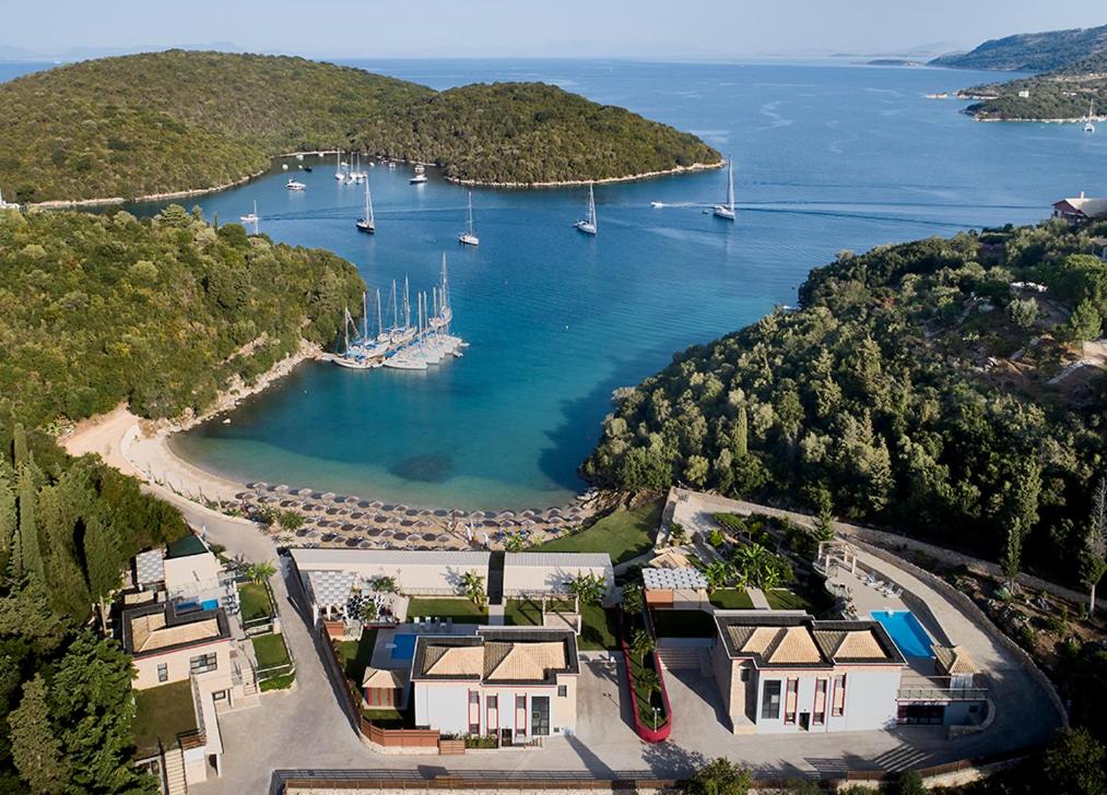 an aerial view of a harbor with boats in the water at Karvouno Villas in Syvota