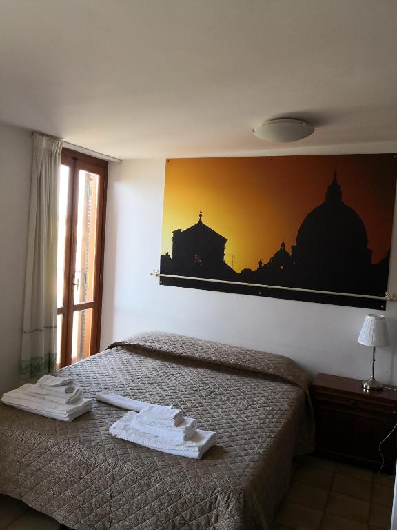 Llit o llits en una habitació de Domus Getsemani