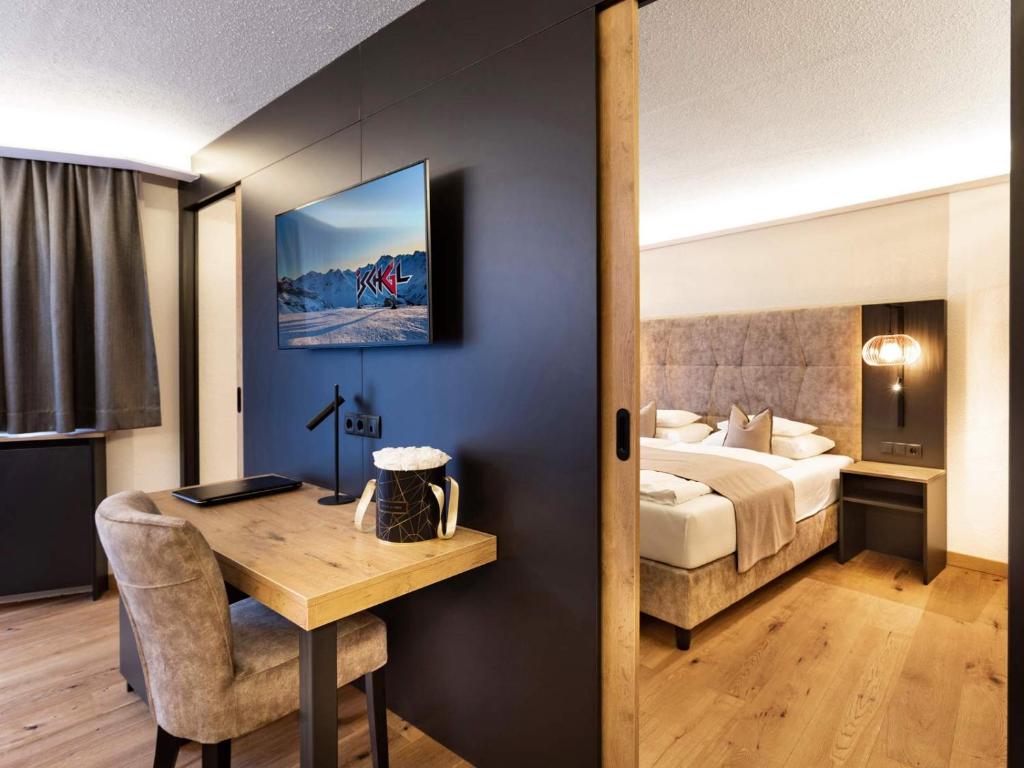 Posteľ alebo postele v izbe v ubytovaní Seiblishof Superior Hotel Ischgl