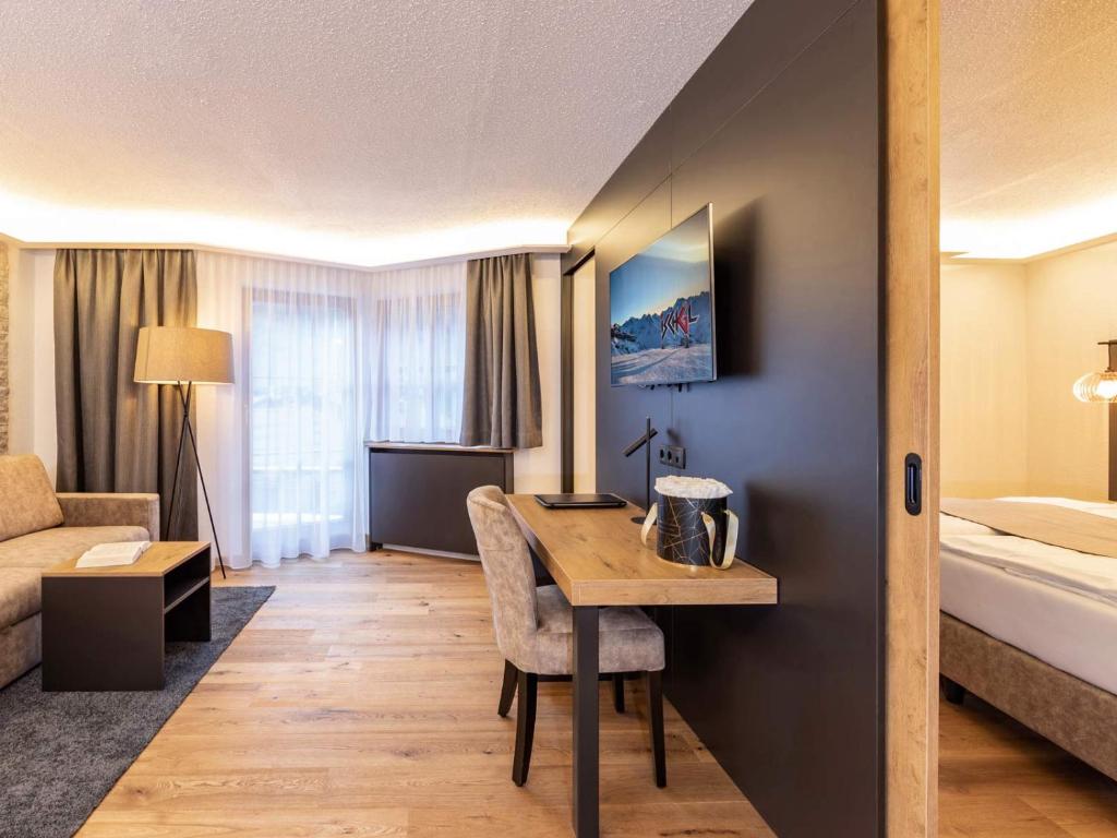 Posteľ alebo postele v izbe v ubytovaní Seiblishof Superior Hotel Ischgl