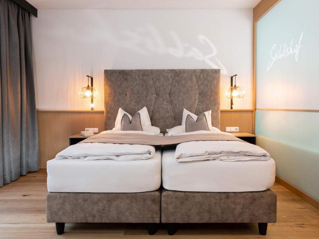 Posteľ alebo postele v izbe v ubytovaní Seiblishof Superior Hotel Ischgl