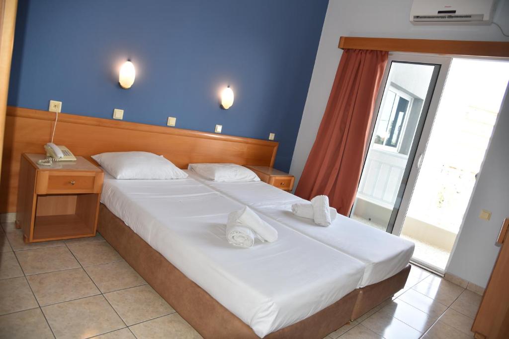 Postel nebo postele na pokoji v ubytování Marine Congo Hotel