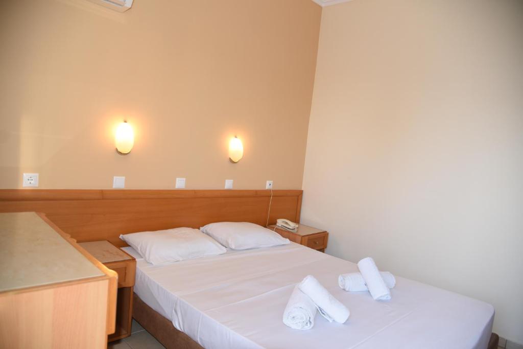 Postel nebo postele na pokoji v ubytování Marine Congo Hotel