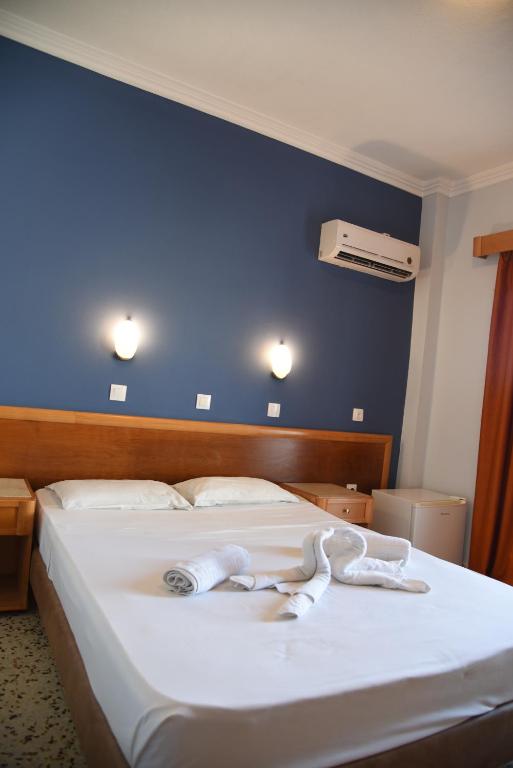 Postel nebo postele na pokoji v ubytování Marine Congo Hotel