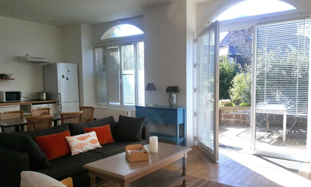 Ruang duduk di Appartement spacieux à 200 m de la plage - Hôtel de l'Europe