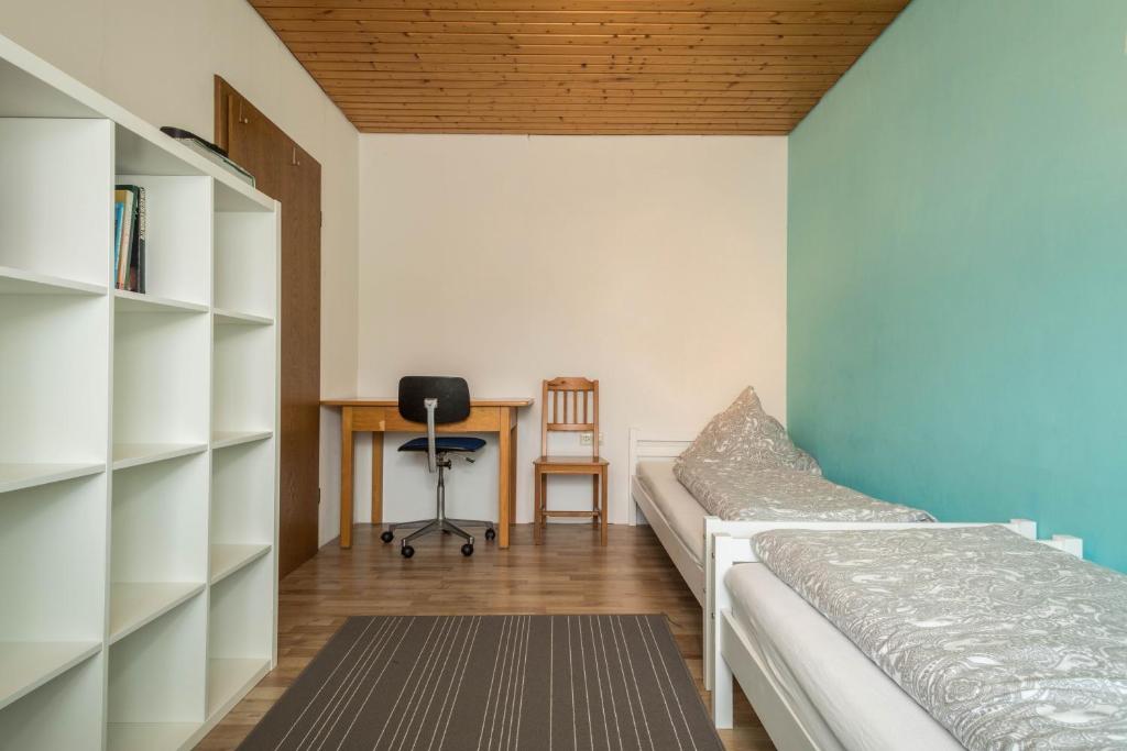 Postel nebo postele na pokoji v ubytování Ferienwohnung im Haus Metzger