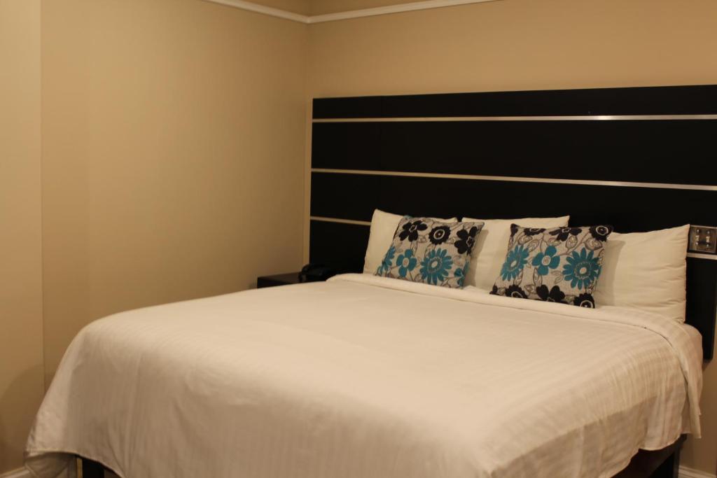 Postel nebo postele na pokoji v ubytování Hotel Cacaxtla