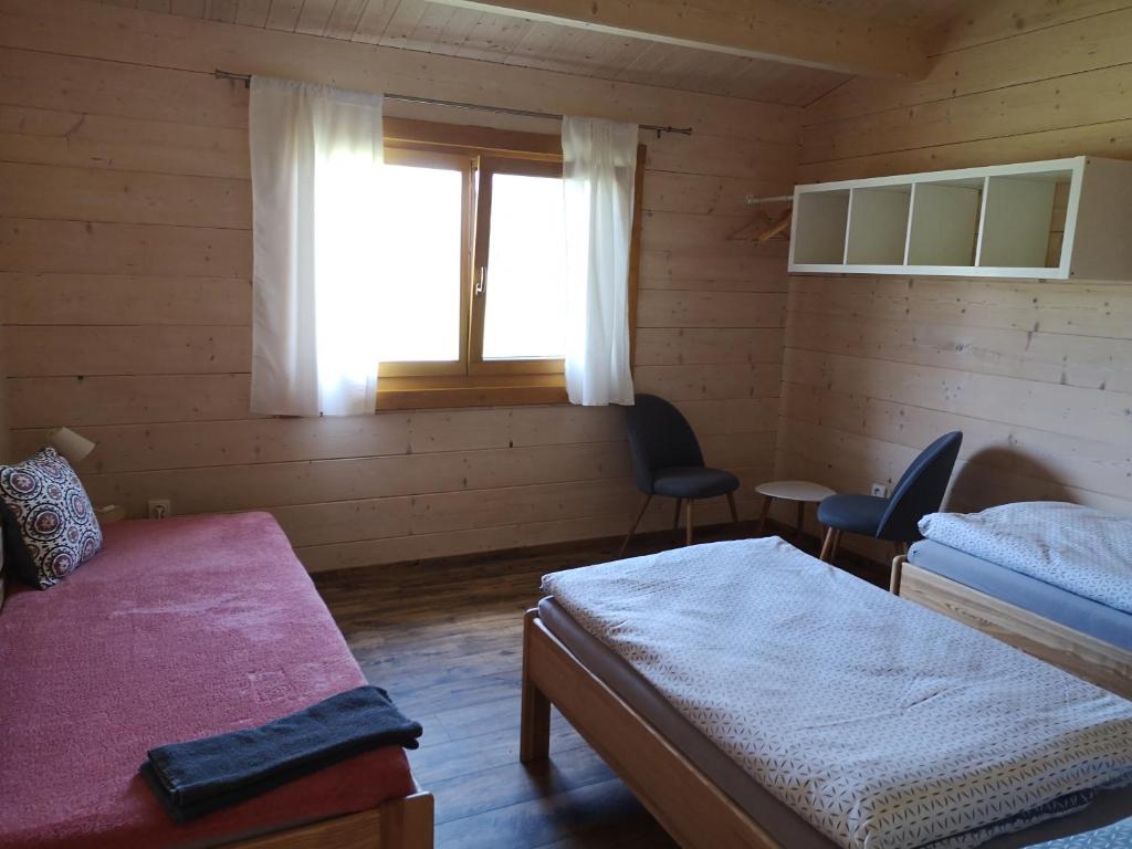 Postel nebo postele na pokoji v ubytování Resort Radslavice