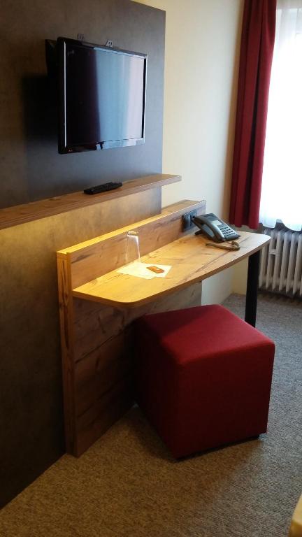TV a/nebo společenská místnost v ubytování Hotel Angerer